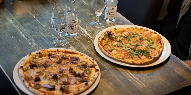 Two pizzas on the table
