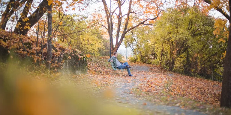 Man sitting on a bench.