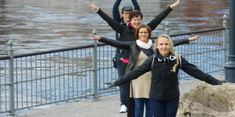 Group in City Adventure, Tammerkoski behind