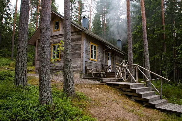 Traditional Finnish Smoke Sauna on the Shore of Lake Tarjanne