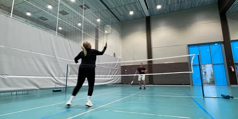 Indoors Badminton court.